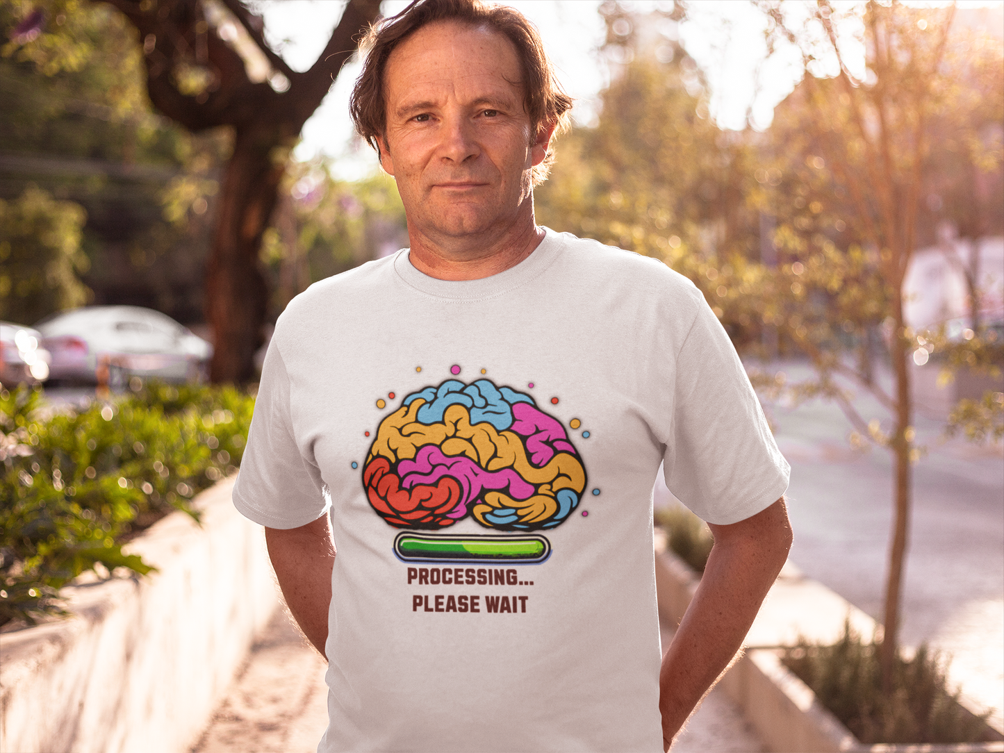 Man wearing Brain Processing Gildan Unisex T-Shirt, featuring a vibrant brain graphic, ideal for casual or relaxed settings, expressing unique style and comfort.