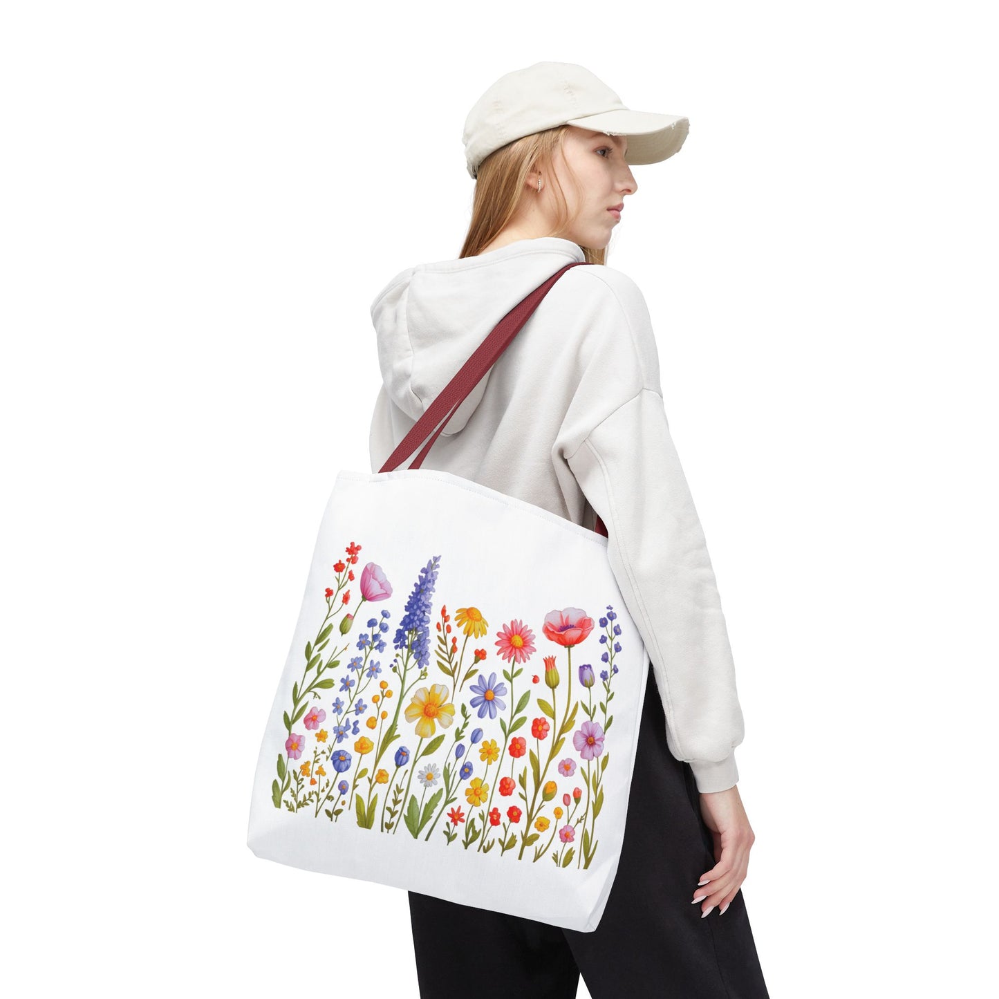 Wildflowers Tote Bag featuring vibrant wildflower designs, emphasizing a free-spirited, natural vibe. Ideal for nature enthusiasts, with durable polyester body, reinforced handles, and available in three sizes for versatile use.