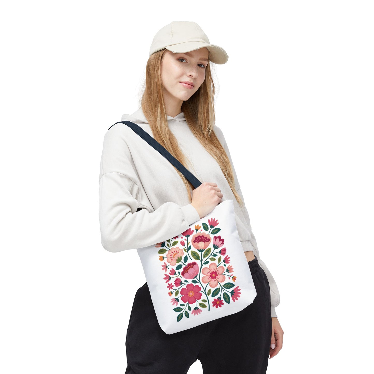 Pink Floral Folk-Art Style Tote Bag featuring vibrant organic floral illustrations in pink tones with green leaves, ideal for carrying essentials, reflecting FireBrook Essentials' commitment to stylish, uplifting designs.