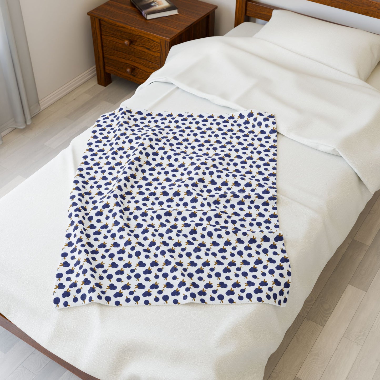 Plush Blanket - Blueberry Pattern drapes elegantly over a bed, showcasing its cozy design. Ideal for adding warmth and style, this blanket is perfect for enhancing home decor with comfort and charm.