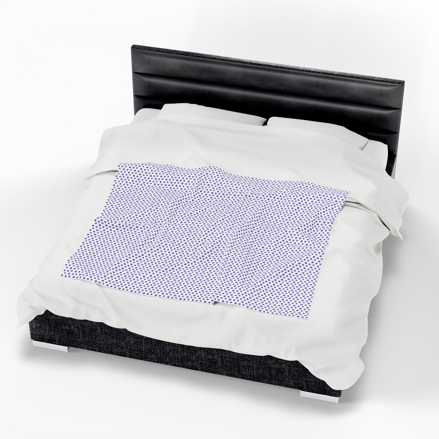 Polka Dots Purple Velveteen Plush Blanket displayed in a cozy living space, showcasing its luxurious texture and vibrant polka dot pattern, epitomizing FireBrook Essentials' commitment to comfort and style.