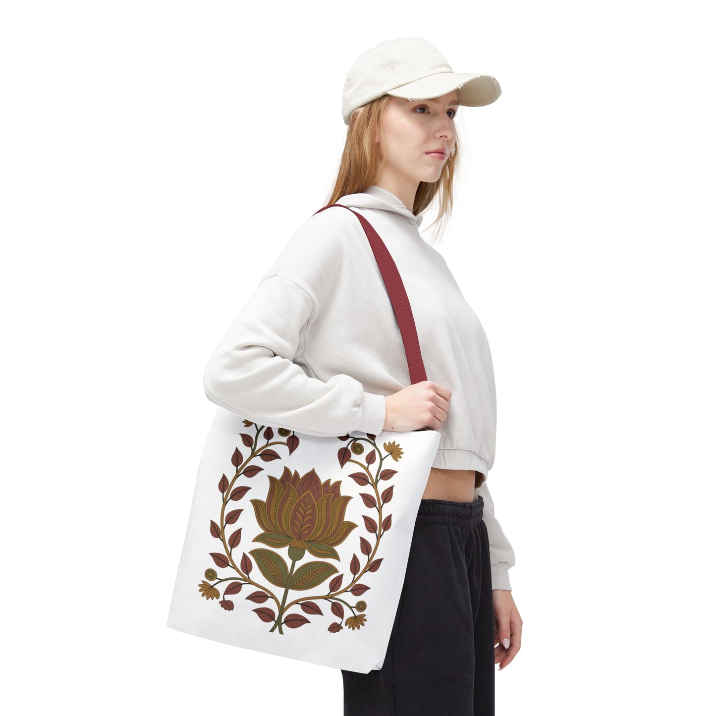 Earth Tote Bag with Floral Vines and Traditional Motifs, showcasing intricate swirling patterns, provides a stylish, nature-inspired accessory. Ideal for daily use, combining durability and elegance for a versatile, spacious carry-all.