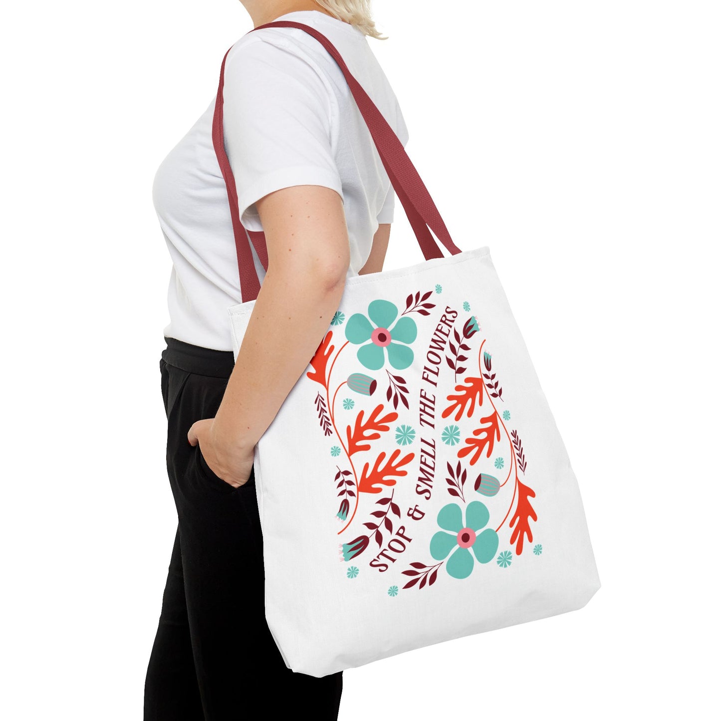 Stop and Smell The Flowers Tote Bag with red strap, featuring floral design, ideal for carrying essentials while spreading positivity.
