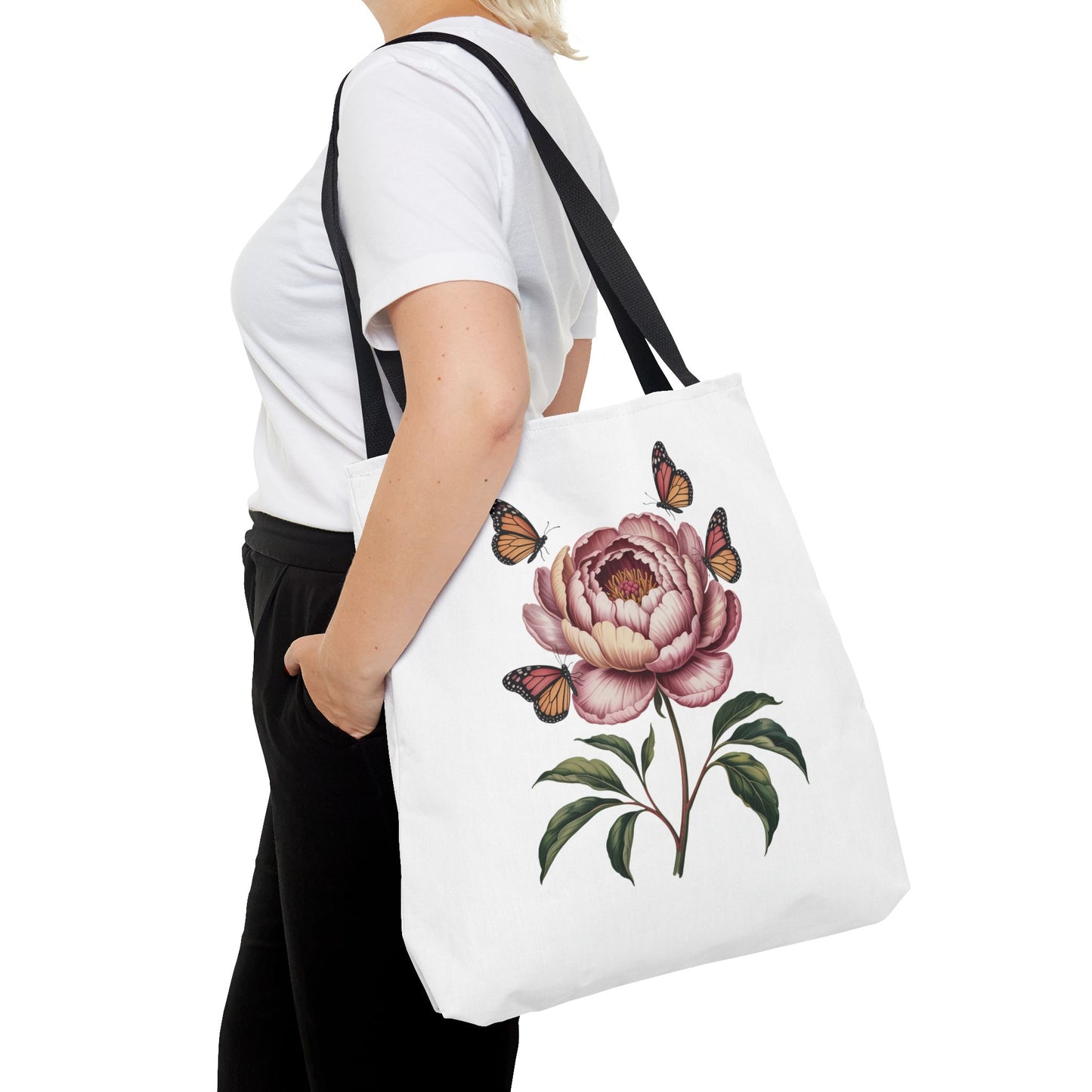 Botanical with Vintage-Inspired Illustration Tote Bag featuring vibrant flowers, intricate leaves, and butterflies. Perfect for nature lovers and casual outings, this elegant design aligns with FireBrook Essentials' uplifting and stylish ethos.