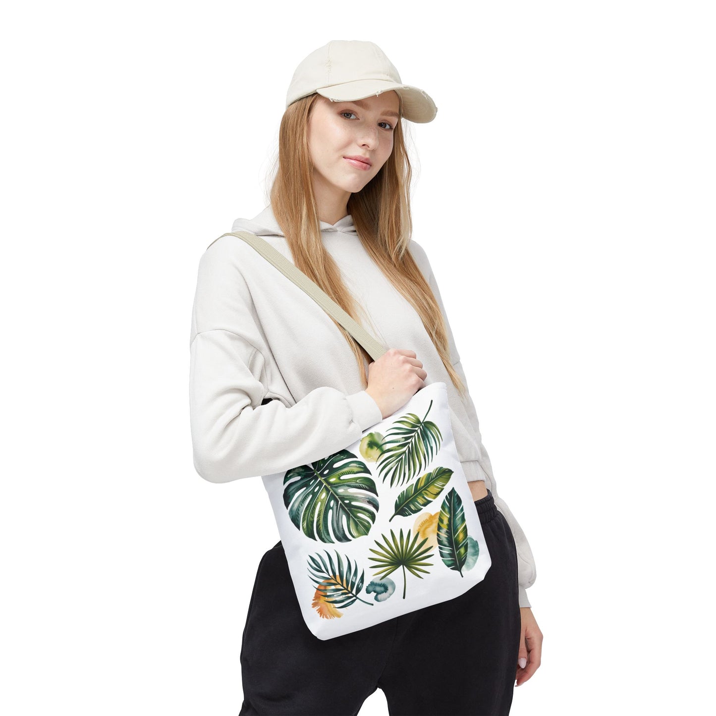 Tropical Leaves Tote Bag, featuring a vibrant leaf pattern, showcases a spacious, durable design ideal for beach outings or shopping. Perfect for tropical enthusiasts seeking stylish, eco-conscious carryalls from FireBrook Designs.