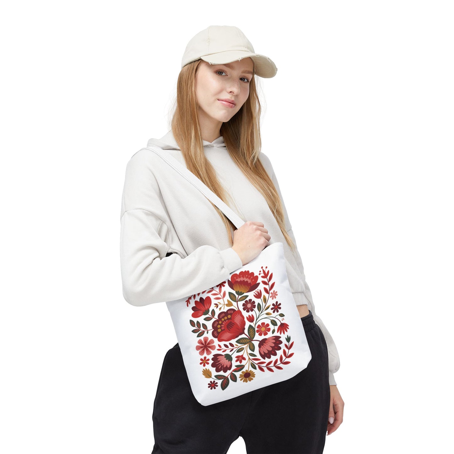 Red Floral Folk-Art Style Tote Bag featuring vibrant, organic floral patterns with red, blush, and blue flowers accented by green leaves, perfect for art lovers seeking a stylish, durable everyday carry solution.