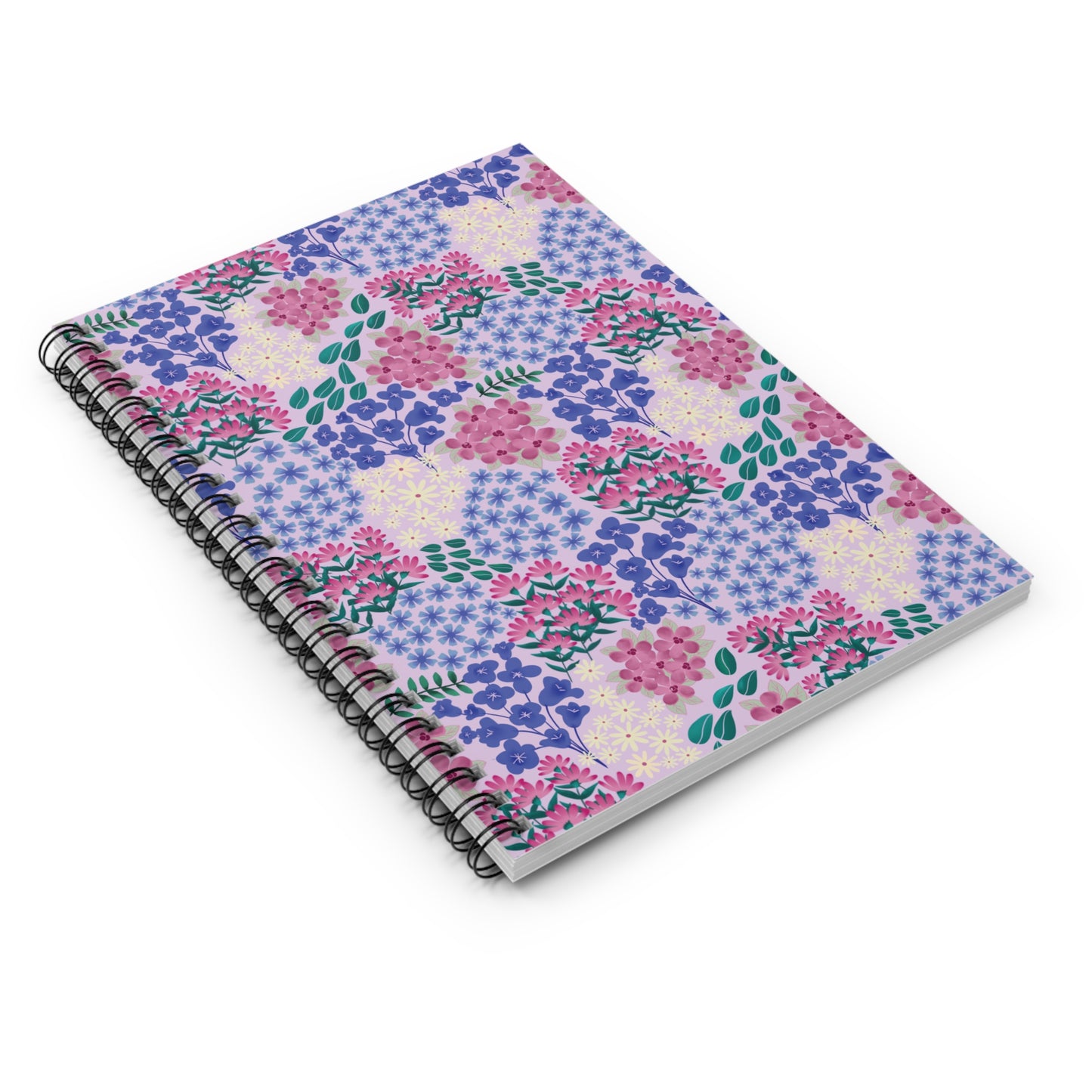 Floral Spiral Notebook featuring a pastel floral pattern on a lavender cover, with sleek black double-loop wire binding, showcasing its creative design and functionality for jotting notes or sketches.