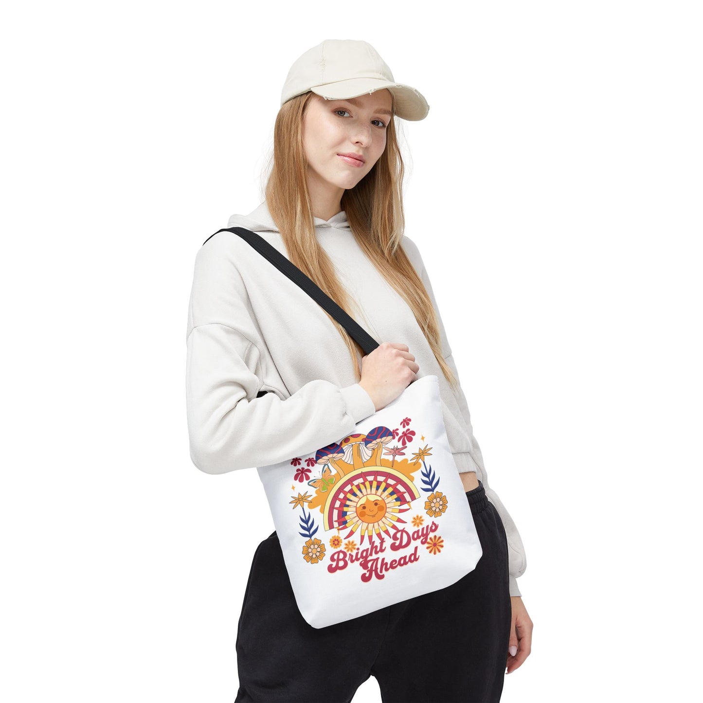 Bright Days Ahead Sunshine Floral Tote Bag showcasing a lively design of sunshine, flowers, and butterflies, ideal for outdoor adventures. Durable, with reinforced handles and available in multiple sizes for versatility.