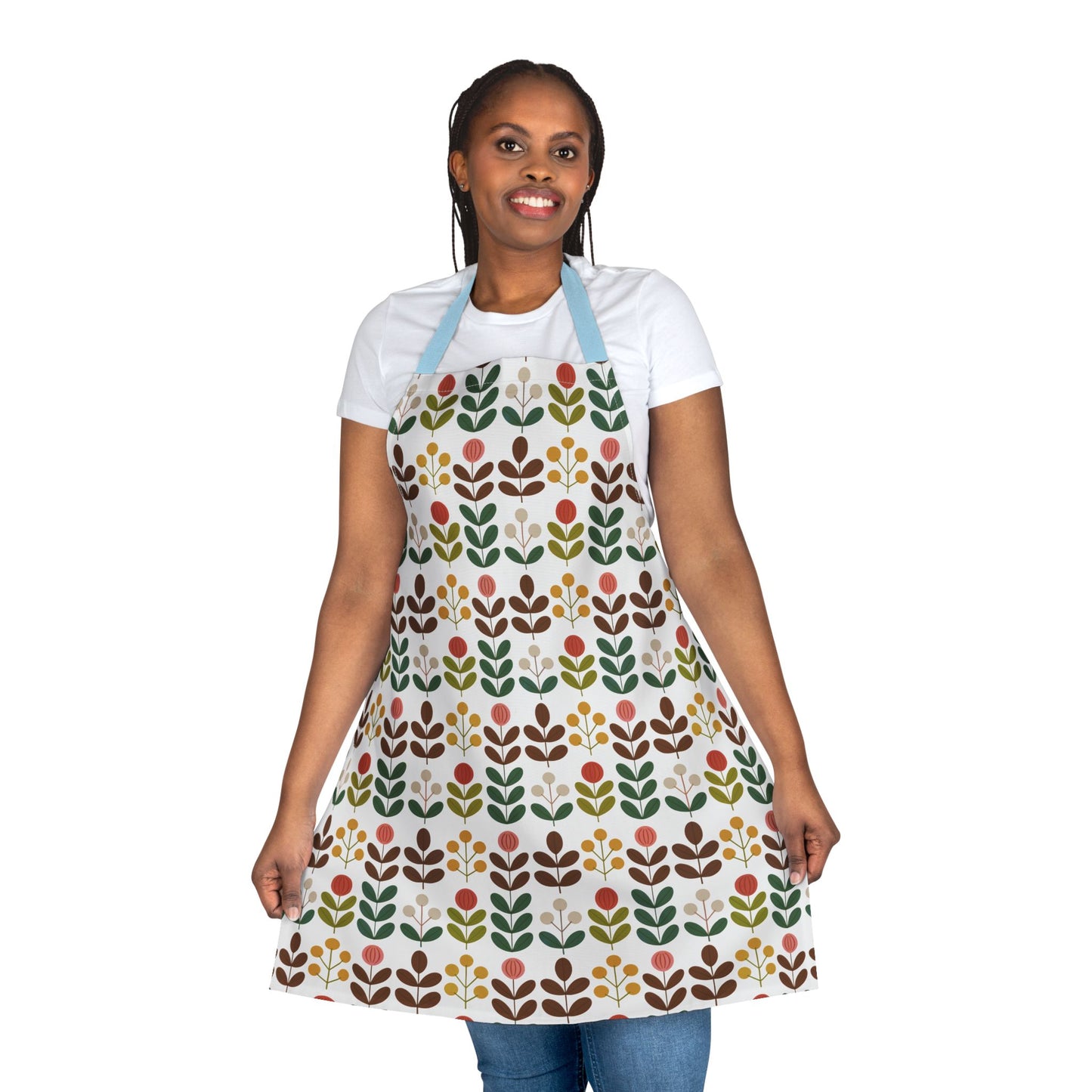 Flower Pattern Apron on a smiling woman, showcasing its vibrant floral design. Ideal for creative cooks or artists, it features a comfortable fit with a tie-back closure, enhancing any kitchen or studio experience.