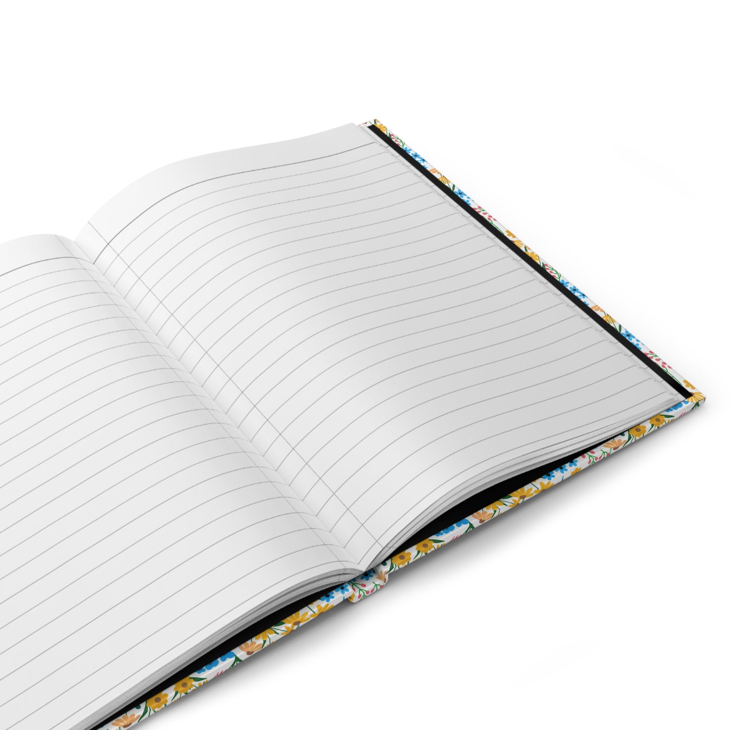 HARDCOVER JOURNAL, MATTE, RULED, 5X7, SEWN BIND, CLEAN-TEAR PAGES – WILDFLOWER MEADOW MIX features open, lined pages with a vibrant floral cover, perfect for capturing thoughts and inspirations.