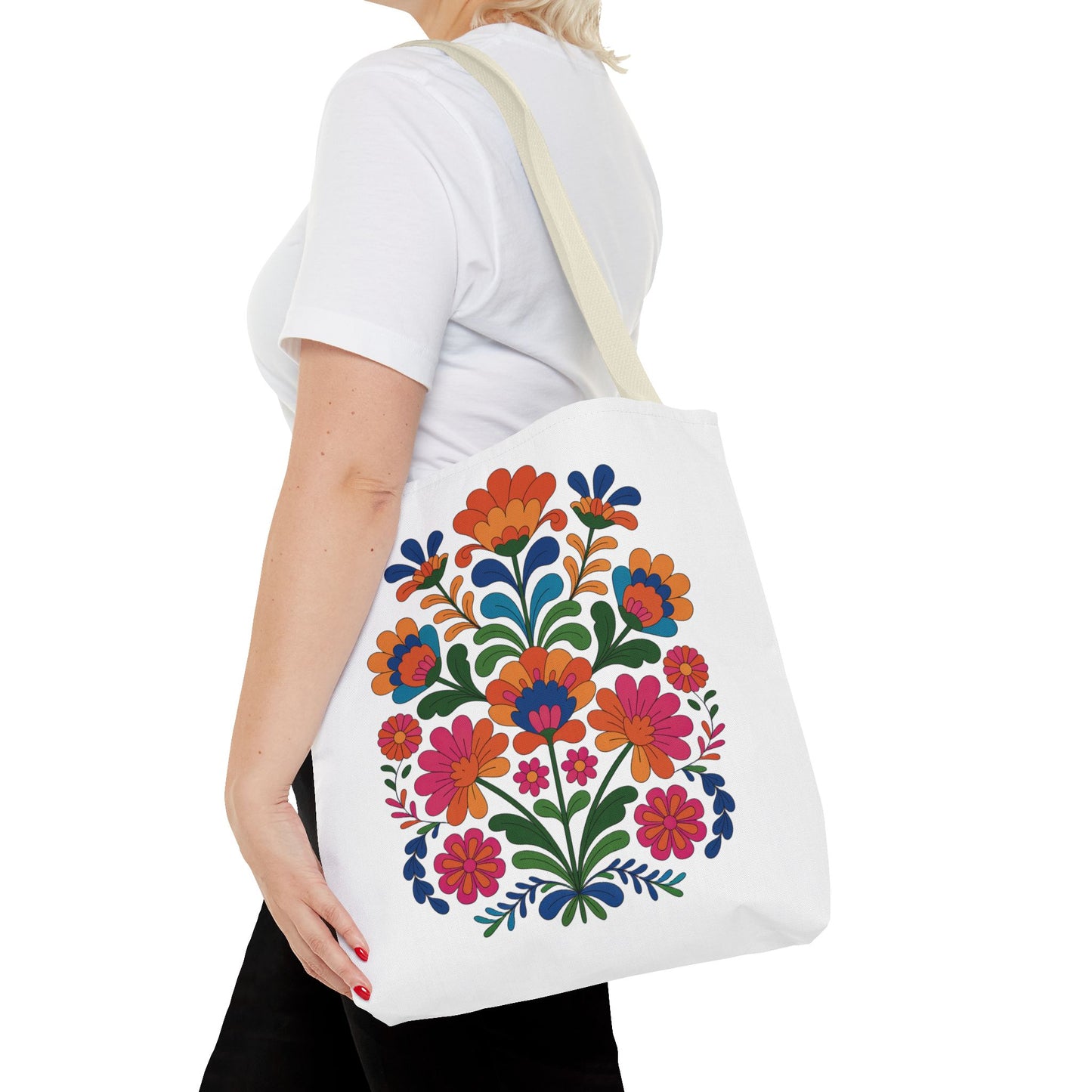 Red Folk-Art Floral Tote Bag featuring a vibrant, organic design with red tones and delicate flowers, ideal for carrying essentials. Crafted for durability and style, perfect for nature lovers and art enthusiasts.