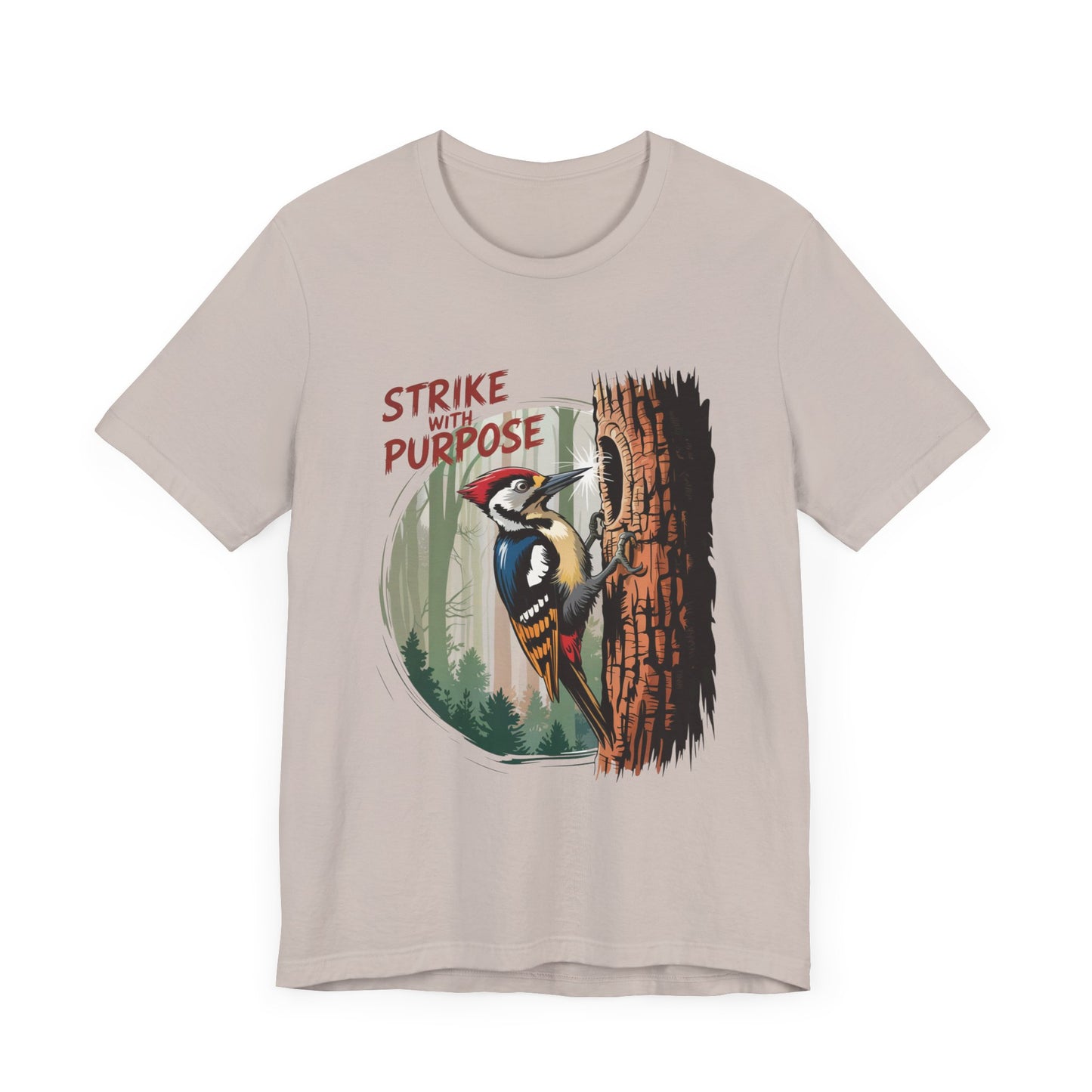 Woodpecker: Strike with a Purpose Bella+Canvas Unisex T-Shirt featuring a cartoon woodpecker on a tree trunk, symbolizing motivation and inspiration, perfect for nature enthusiasts and casual wear.
