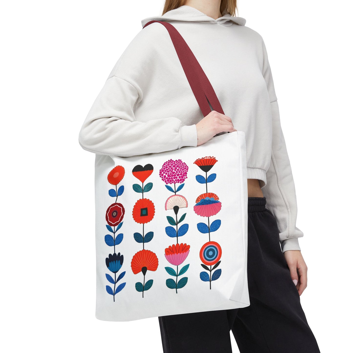 Floral Pattern Tote Bag held by a woman, showcasing its stylish design. Ideal for carrying essentials with elegance and functionality.