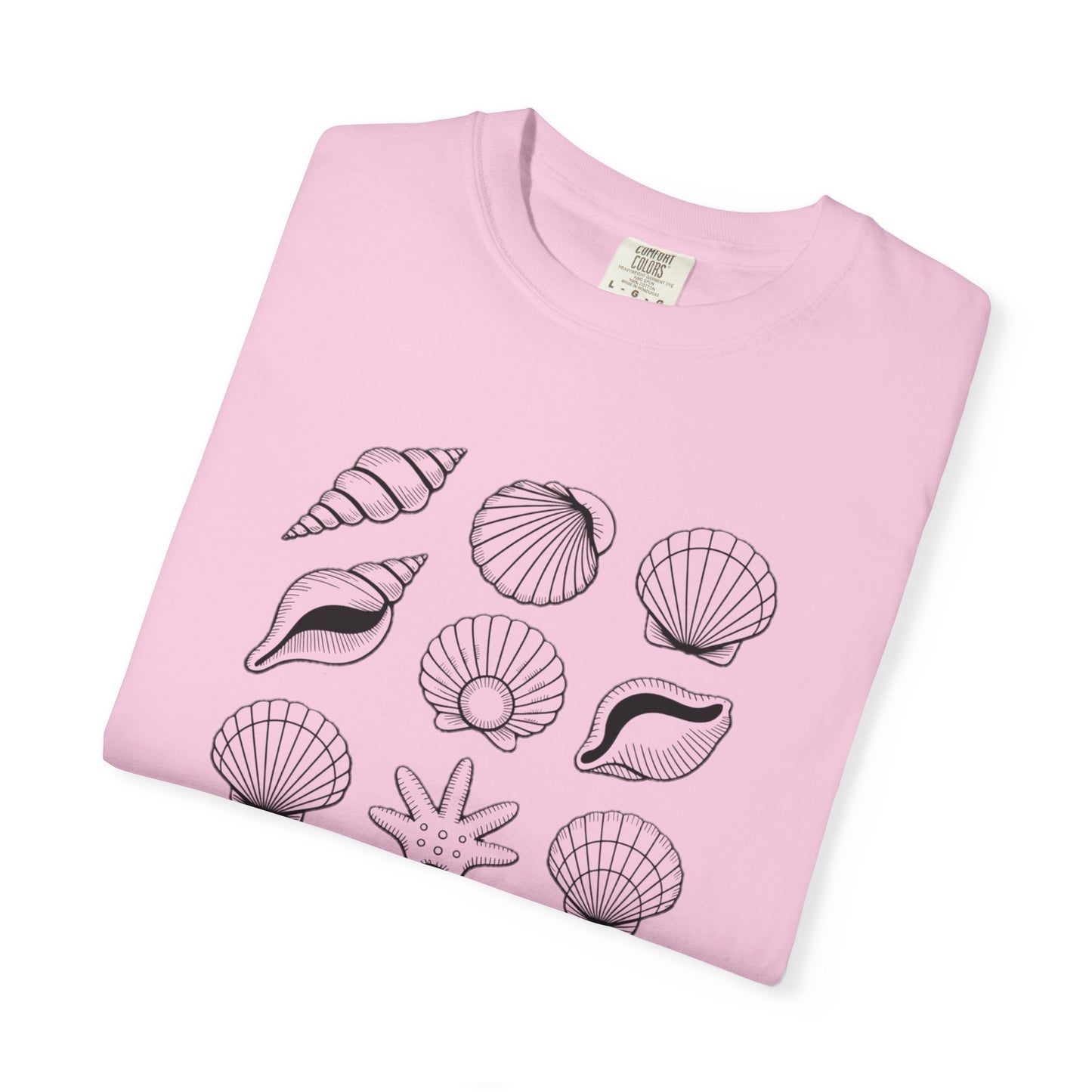 Seashells and Sea You Soon T-Shirt features a seashell design with text, offering a beachy, relaxed vibe. Ideal for ocean lovers seeking comfort and style from FireBrook Essentials.
