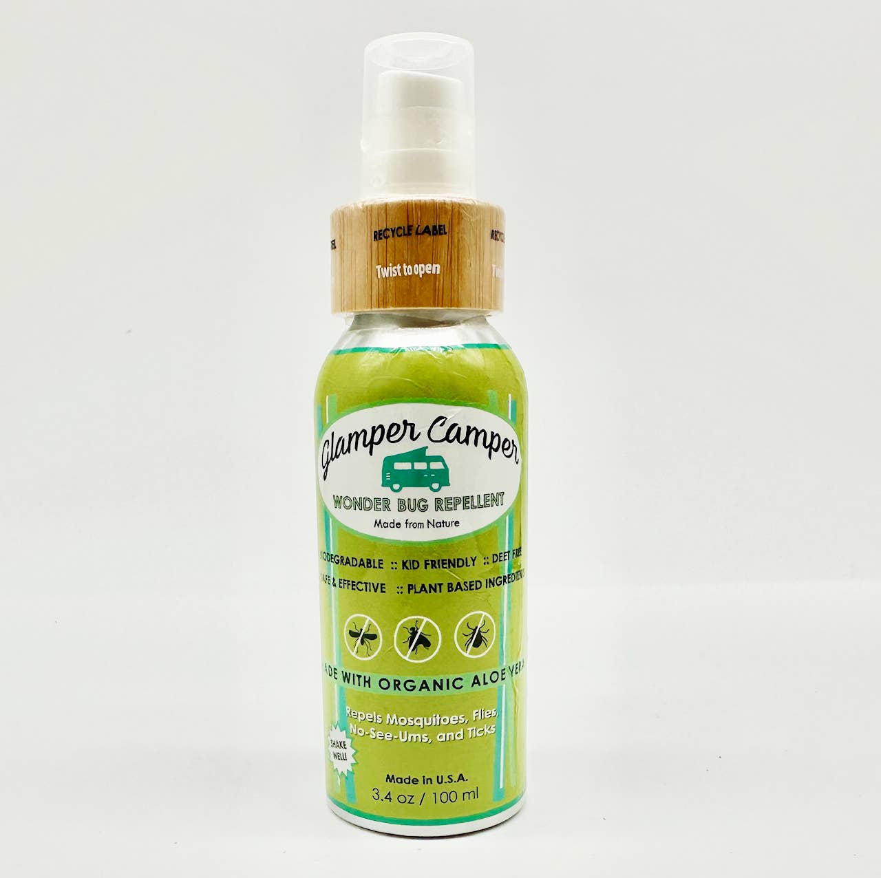 Glamper Camper Wonder Bug Repellent, a 3.4 oz spray, features a green label, bamboo-look cap, and highlights biodegradable, DEET-free, plant-based formula with organic aloe vera. Ideal for outdoor travel use.