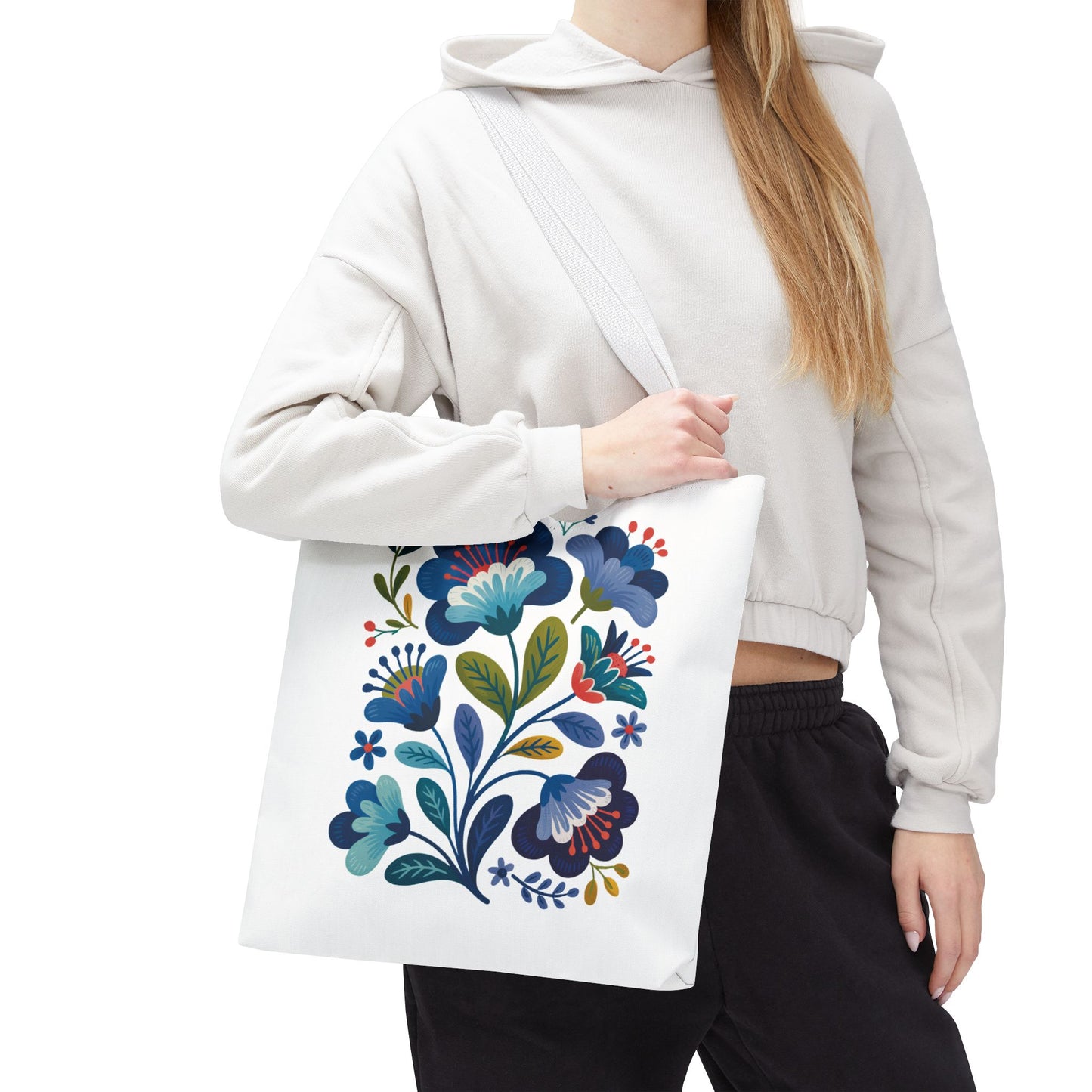 Vintage Folk Art Design Blue Floral Tote Bag showcasing a charming, nostalgic folk art floral pattern, perfect for daily use or special occasions, designed for those who love unique, standout accessories.