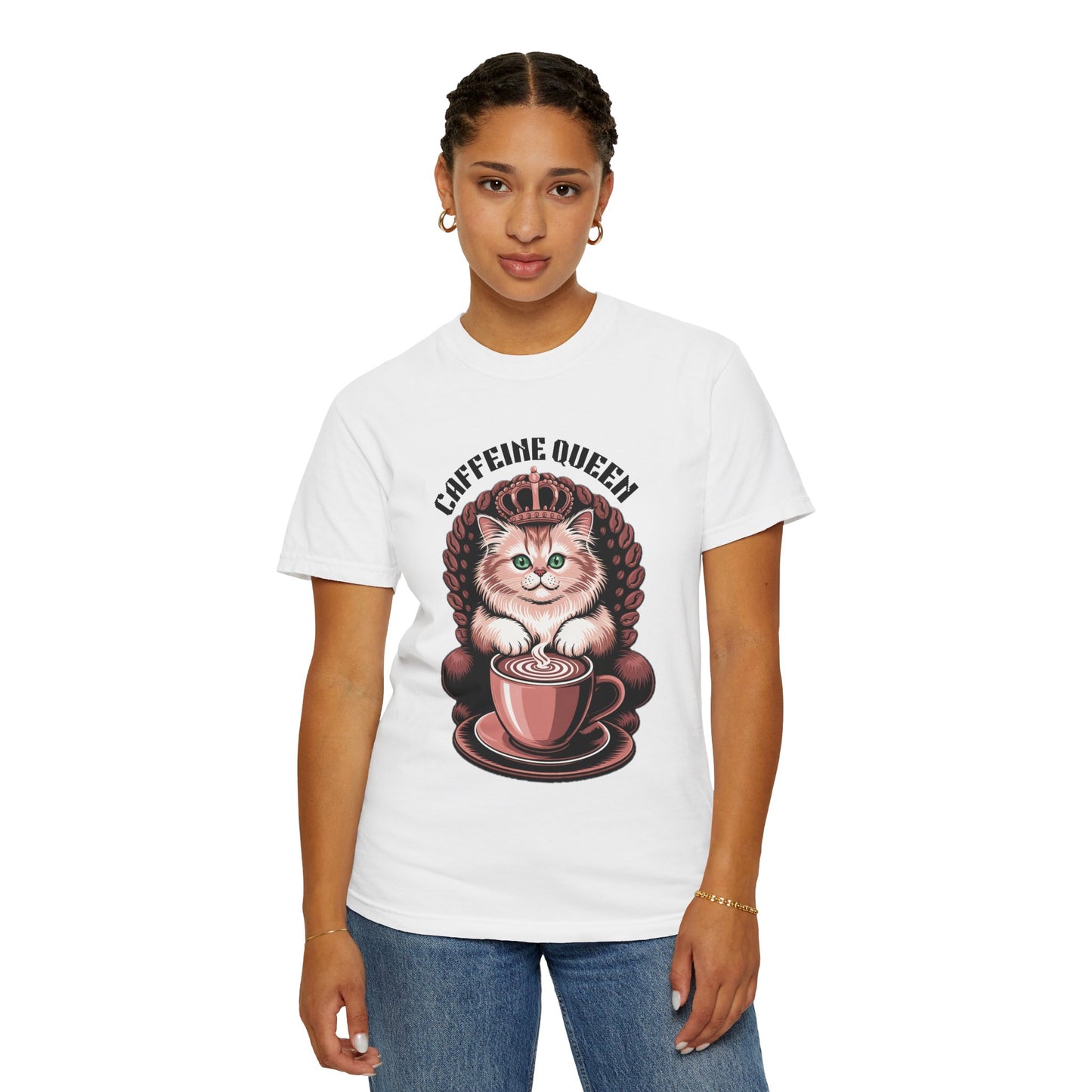 The Cat Caffeine Queen T-shirt features a crowned cat enjoying coffee, worn by a woman, epitomizing playful style for cat and coffee enthusiasts. Perfect addition to any casual outfit.