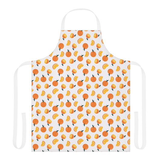 Oranges Apron featuring a lively orange pattern on white fabric, showcasing vibrant design, adjustable straps, and stain-resistant material, ideal for joyful cooking or crafting. Perfect for the stylish, practical enthusiast.
