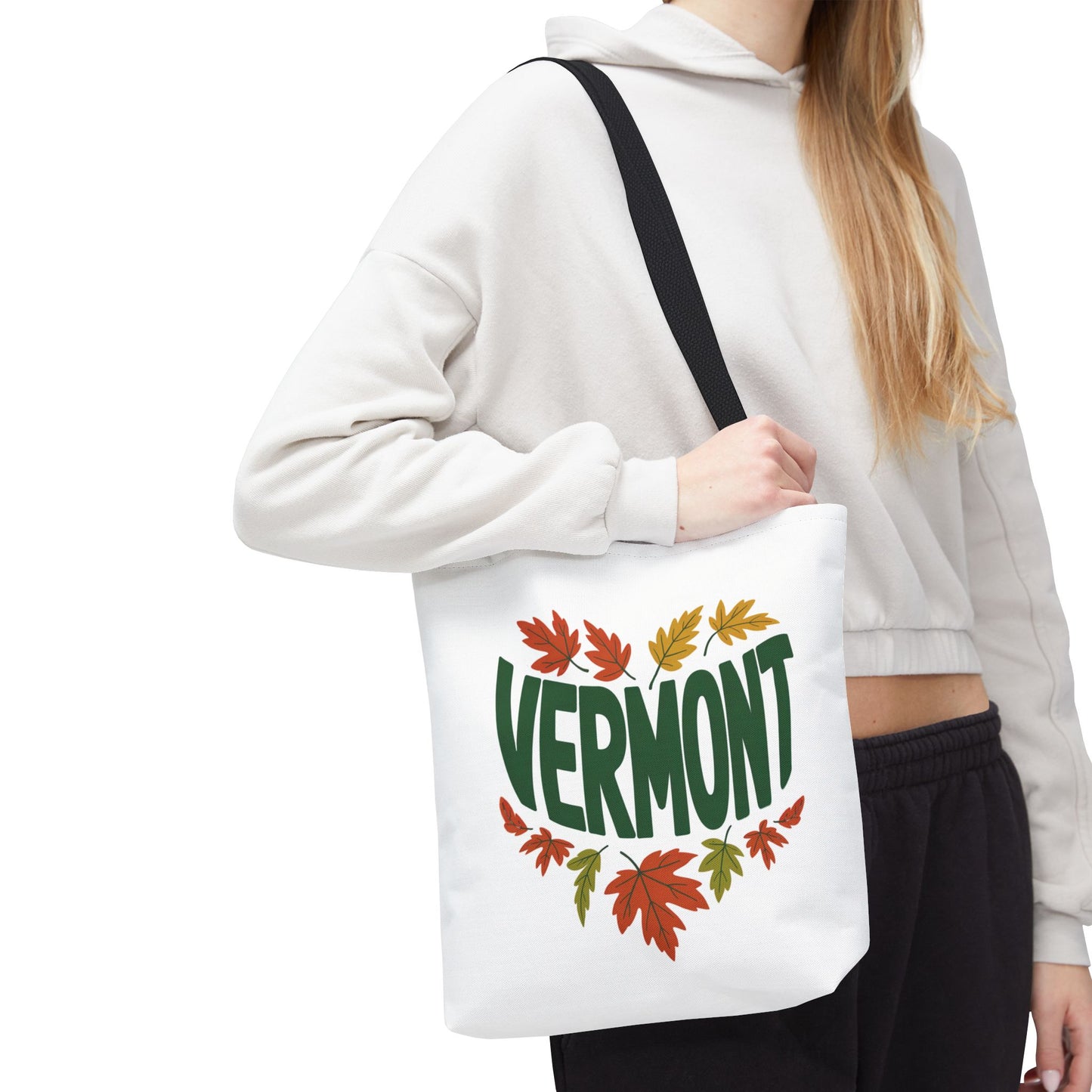 Vermont Tote Bag held by a person, showcasing its stylish design and reinforced stitching. Ideal for daily use, this durable accessory epitomizes FireBrook Essentials' blend of functionality and uplifting style.