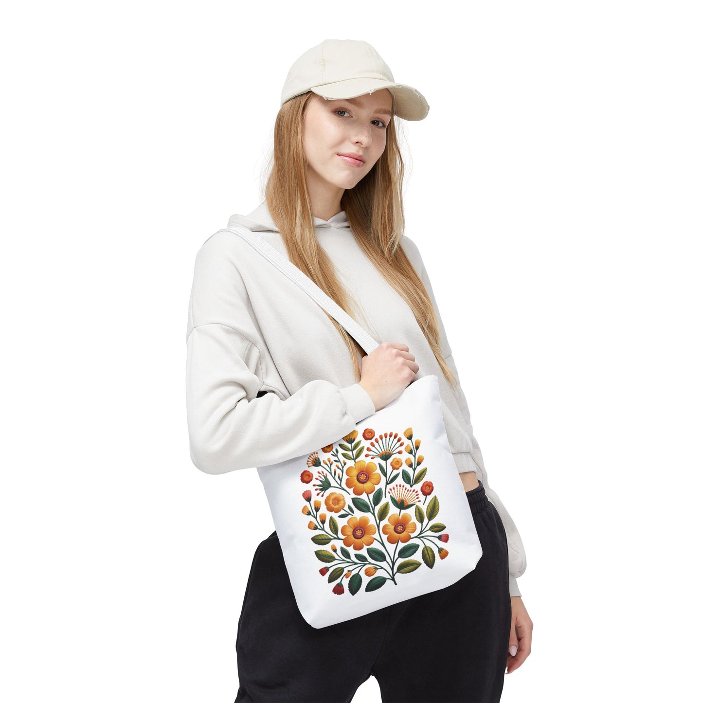 Folk Art Floral Faux Embroidery Style Tote Bag featuring a vibrant floral design with yellow and earth-toned accents, perfect for daily use and ideal for those who appreciate artistic, unique accessories.