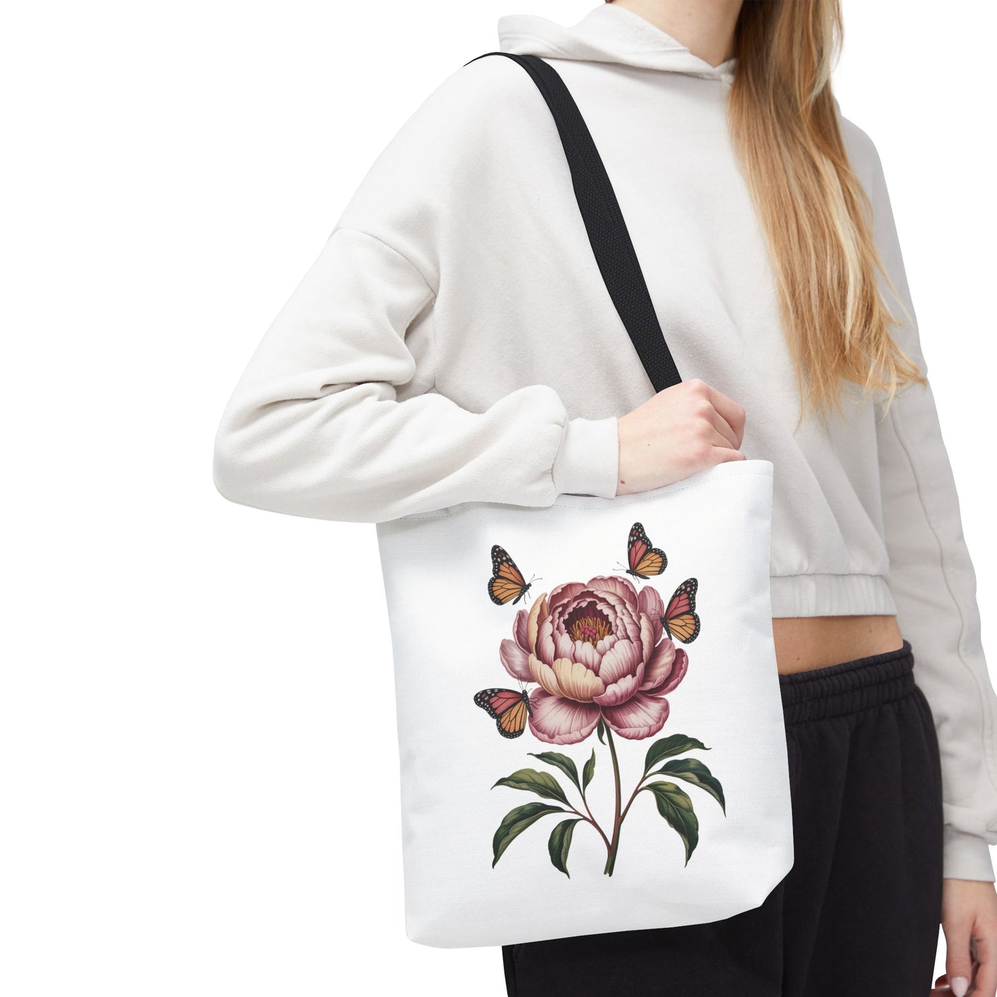 Botanical with Vintage-Inspired Illustration Tote Bag featuring vibrant flowers, intricate leaves, butterflies, and moths. Perfect for nature lovers, with durable polyester, reinforced handles, and available in three sizes.