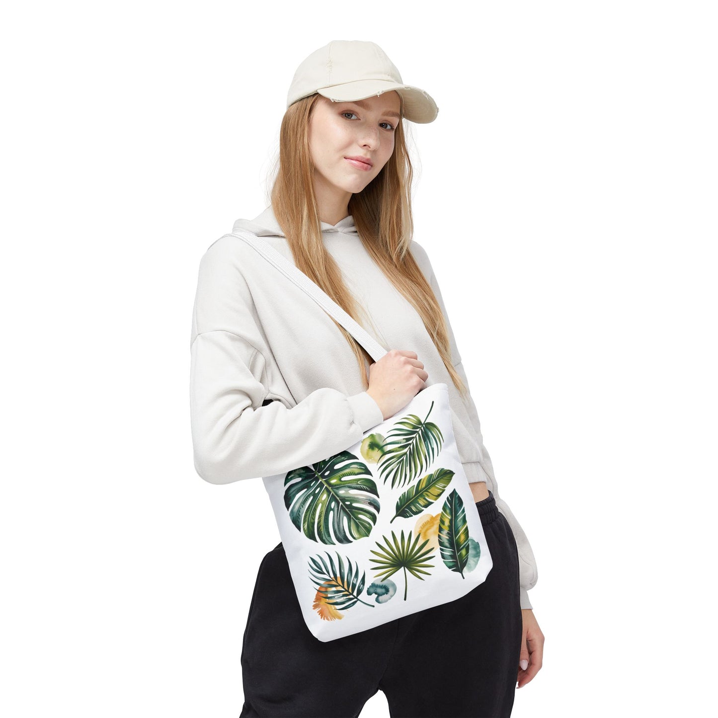 Tropical Leaves Tote Bag with close-up leaf patterns, reflecting a fresh, summery vibe, perfect for beach outings or shopping. Designed by FireBrook Designs for eco-conscious individuals seeking style and durability.