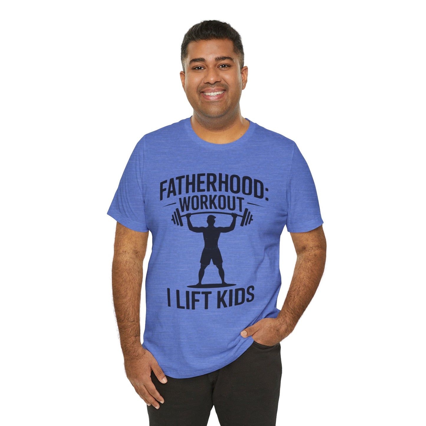 Man in blue shirt smiling, wearing a I Lift Kids Bella+Canvas T-Shirt, reflects playful fatherhood, ideal for casual, joyful occasions.