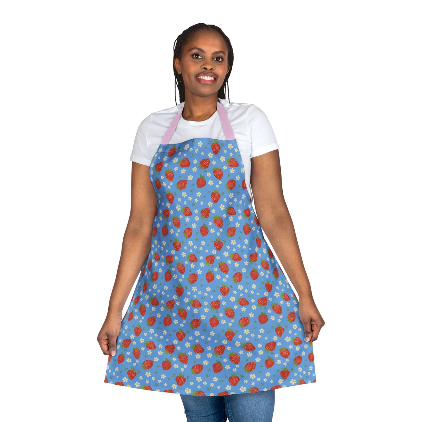 Close-up of a smiling woman wearing the Apron, Strawberry 5-Color Straps, showcasing its vibrant strawberry pattern and comfortable tie-back closure for a stylish and practical cooking accessory.