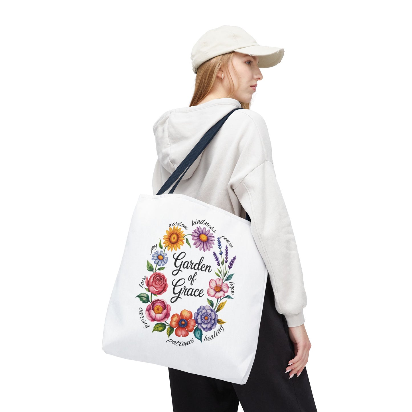 The Garden of Grace Watercolor Design Tote Bag showcases hand-drawn pastel flowers and elegant script, perfect for adding charm to outfits. Available in multiple sizes, it’s a stylish, durable choice for everyday use.