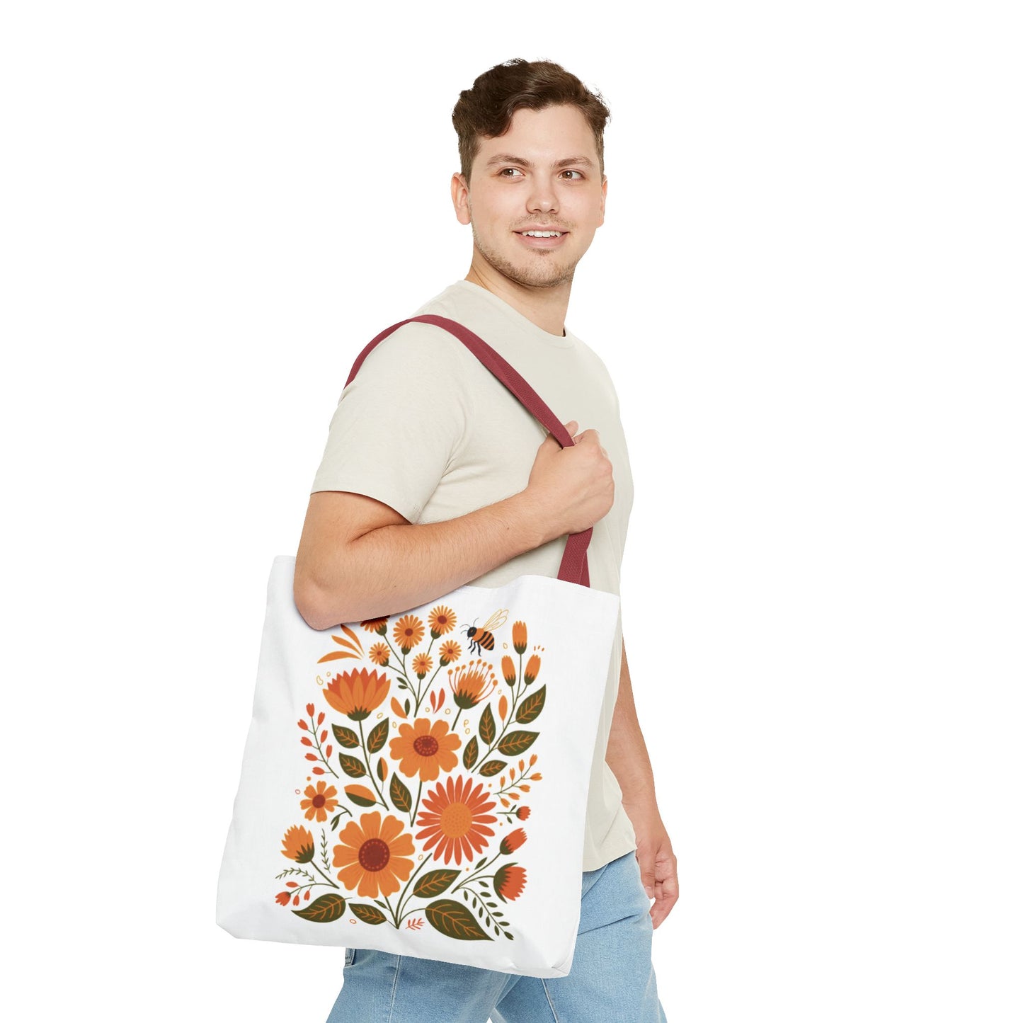 Folk Floral Tote Bag showcasing hand-drawn wildflowers in warm tones on a white backdrop. Designed for durability and style, it complements any nature lover's daily activities with its vibrant folk art charm.