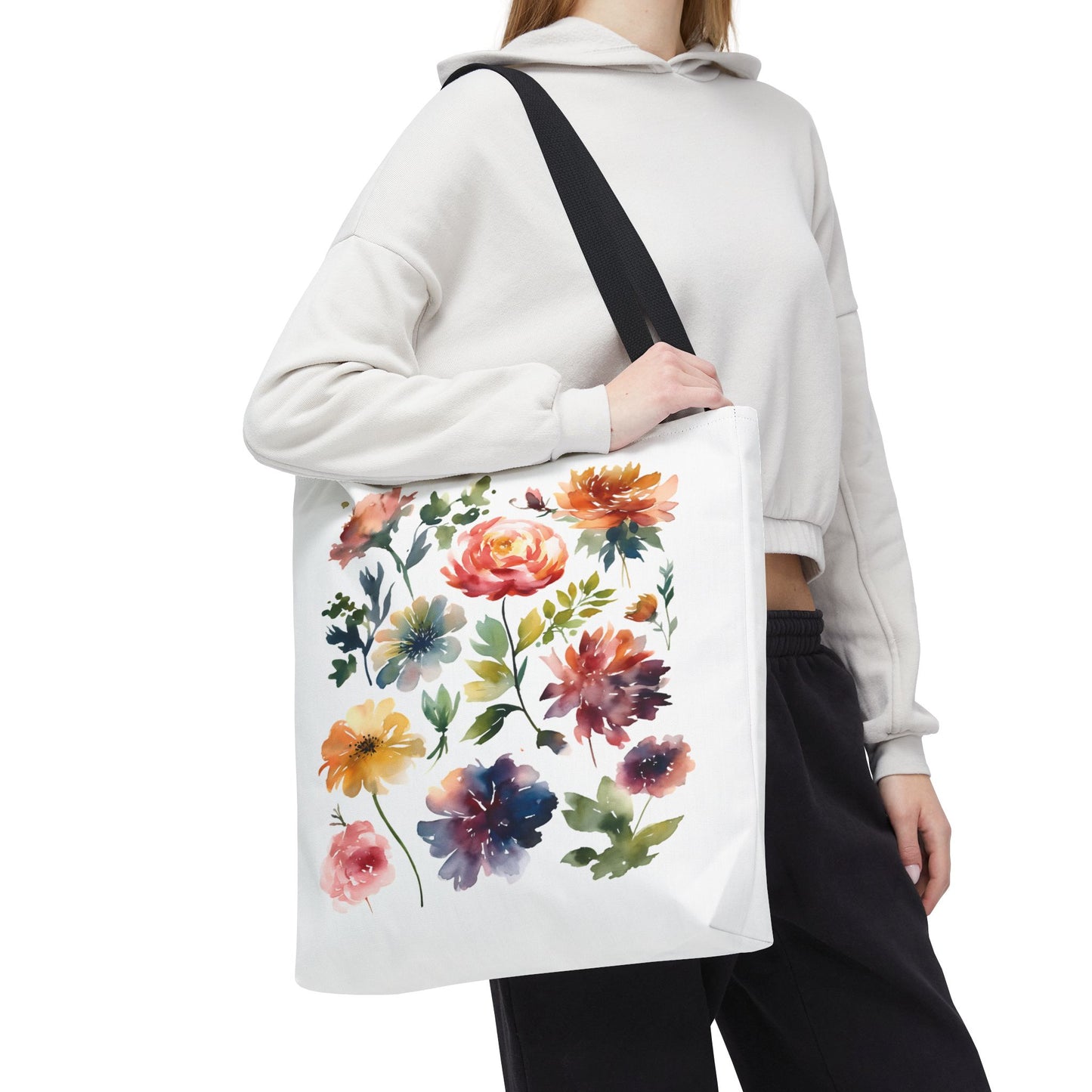 Watercolor Floral Tote Bag held by a woman, showcasing its artistic flower design, perfect for everyday use with reinforced handles and spacious interior.