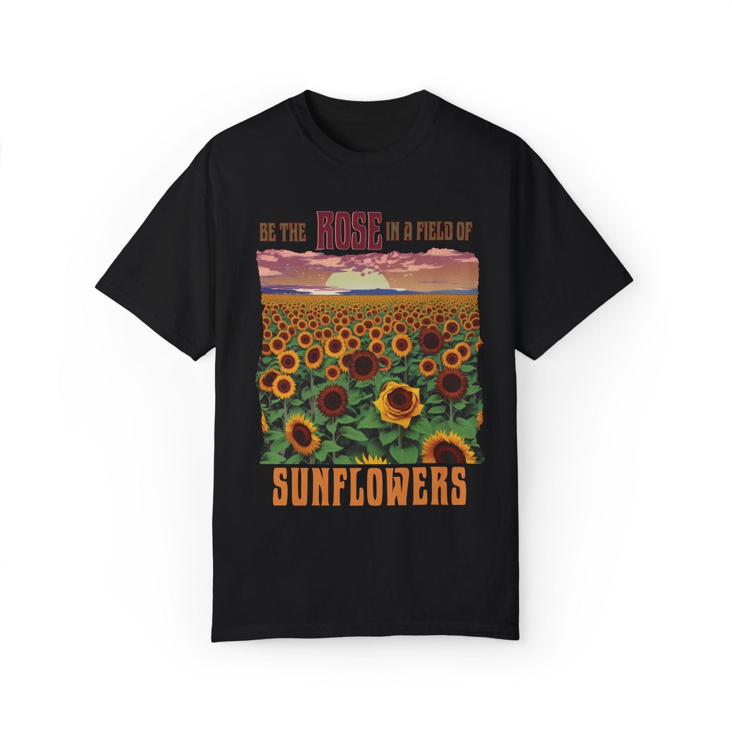 The 'Be the Rose in a Field of Sunflowers T-shirt' features an uplifting quote, double-needle stitching, and garment-dyed softness, exemplifying FireBrook Essentials' commitment to comfort and positivity in everyday wear.