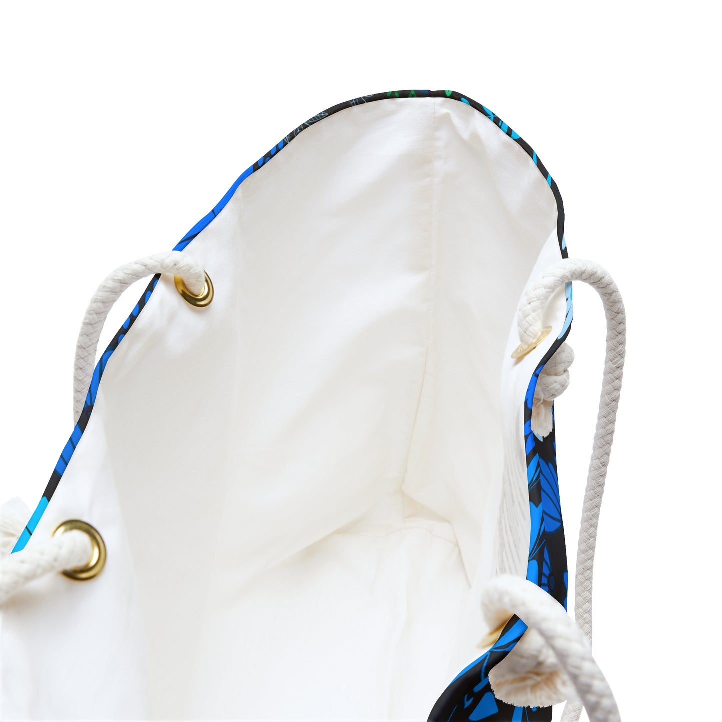 Floral Weekender Bag with spacious off-white interior and durable braided rope handles through brass-tone grommets, showcasing FireBrook Designs' commitment to stylish, practical, and uplifting travel essentials.