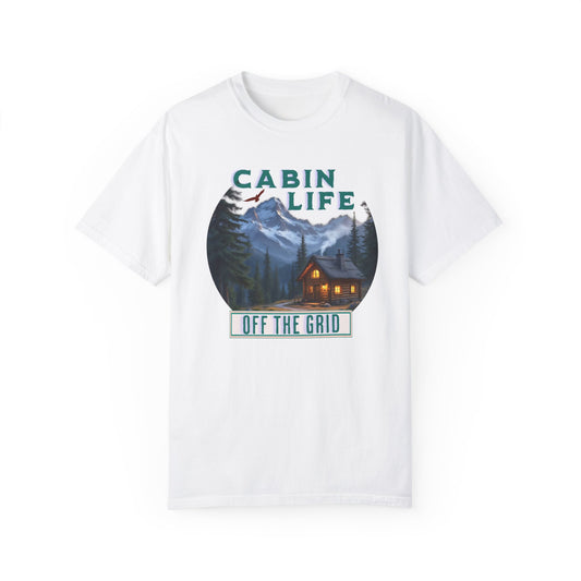 Cabin Life Off The Grid Comfort Colors Unisex T-Shirt features a serene cabin and mountain scene, embodying rustic charm and outdoor adventure, perfect for nature enthusiasts seeking comfort and style from FireBrook Essentials.