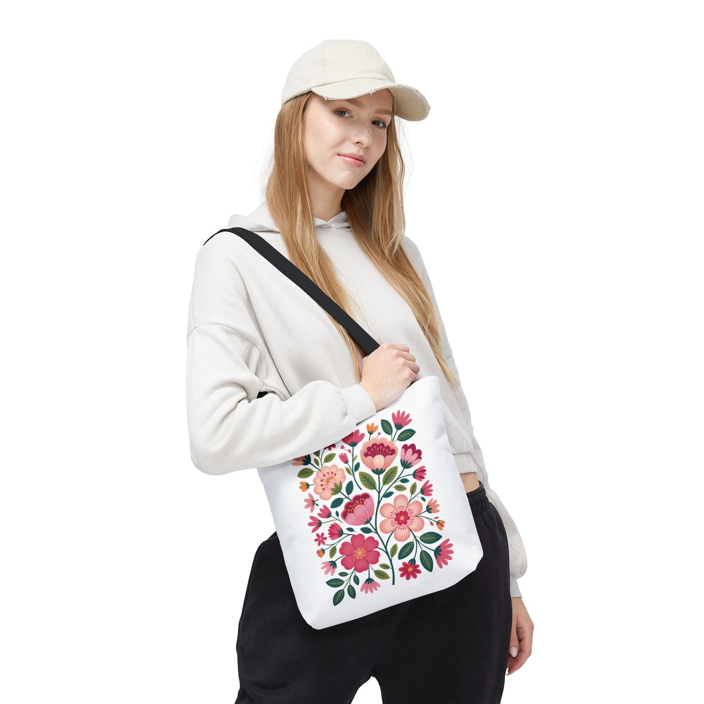Pink Floral Folk-Art Style Tote Bag featuring vibrant pink and magenta flowers with dusty green leaves, ideal for everyday use. Durable polyester with reinforced handles, perfect for art enthusiasts and nature lovers.