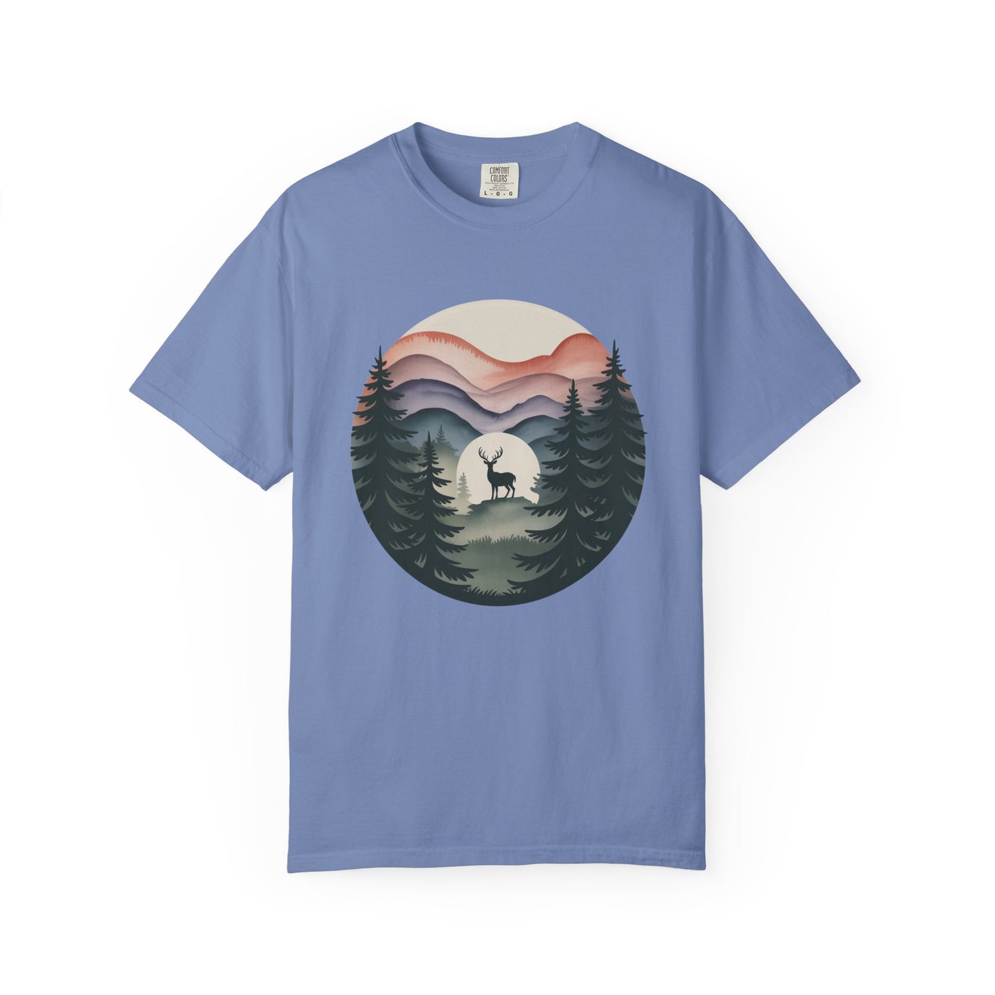 Nature Wanderer T-Shirt features a serene sage-green with mountain silhouettes, celestial moon, and a minimalist stag, embodying wilderness and tranquility, perfect for nature lovers seeking comfort and style.