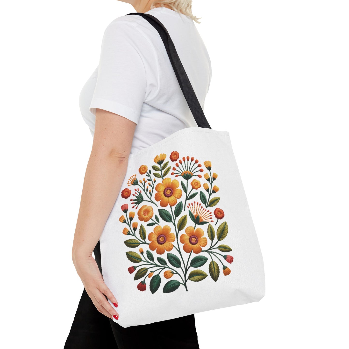 Folk Art Floral Faux Embroidery Style Tote Bag showcases a vibrant floral design with warm yellows and earth tones, perfect for art lovers seeking unique, joyful accessories from FireBrook Essentials.