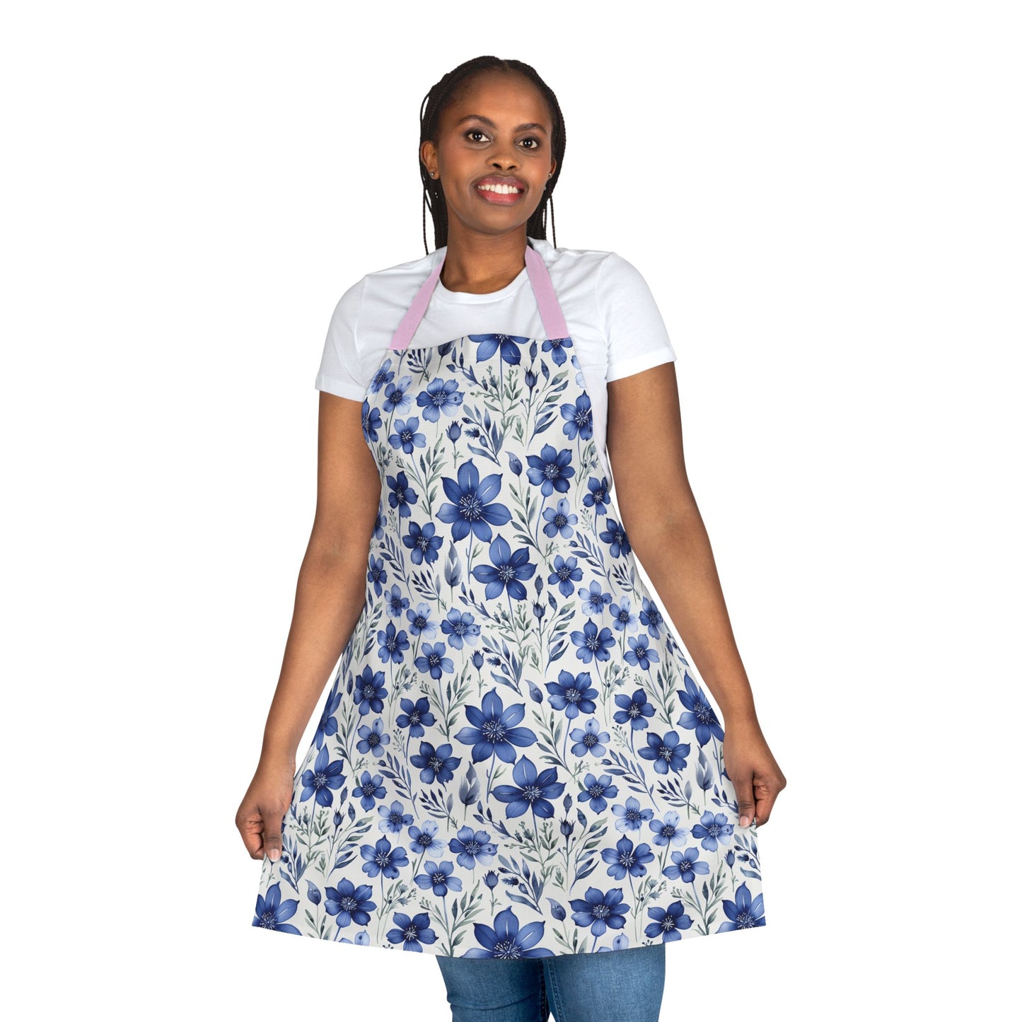 Apron, Blue Wildflower Pattern: A close-up of a woman wearing a hand-painted indigo blue apron featuring a calming wildflower design, highlighting its artistic vibe and perfect fit for various creative pursuits.