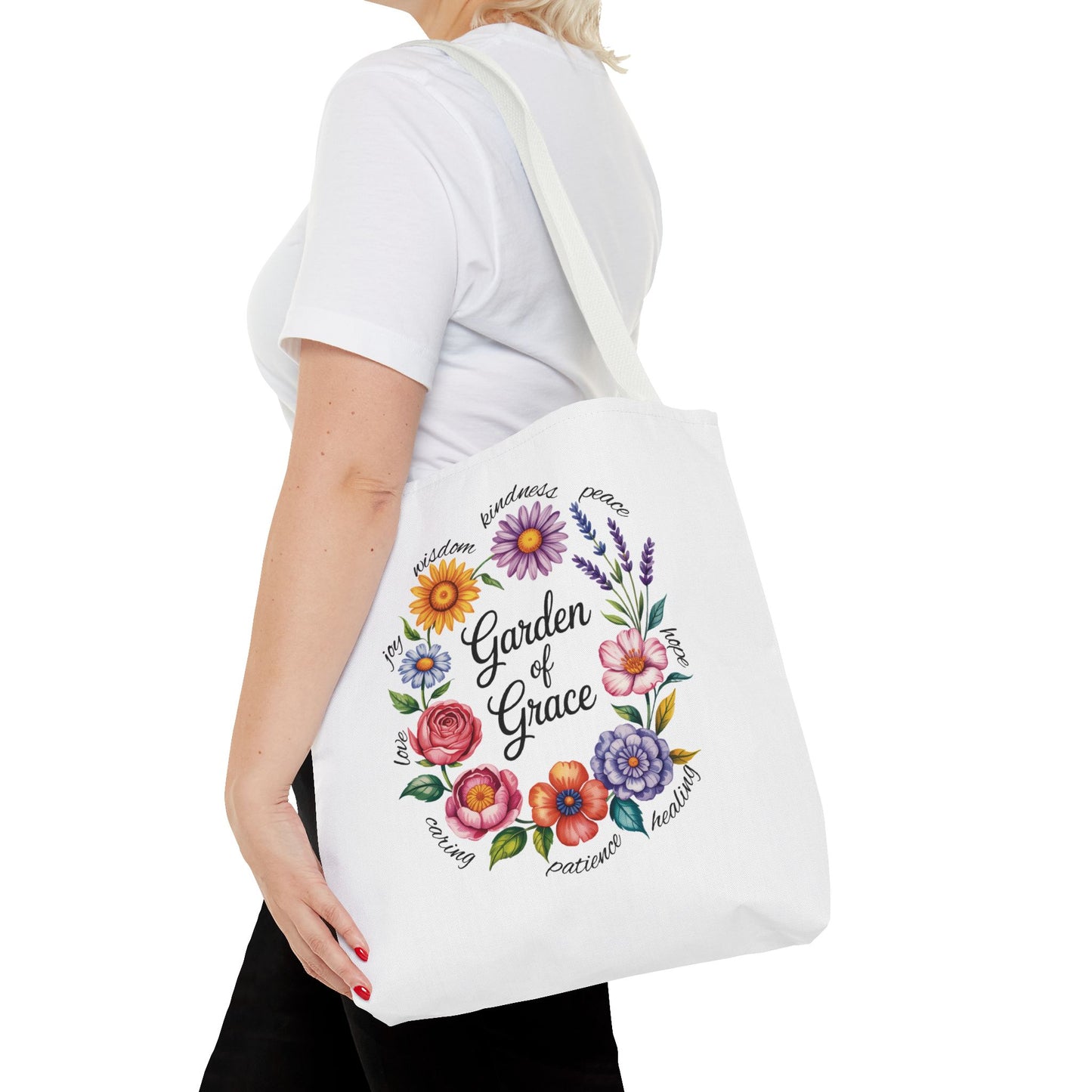 Garden of Grace Watercolor Design Tote Bag showcasing hand-drawn pastel flowers and elegant script, embodying nature's charm and grace. Perfect for everyday use or gifting, reflecting FireBrook Essentials' uplifting style.