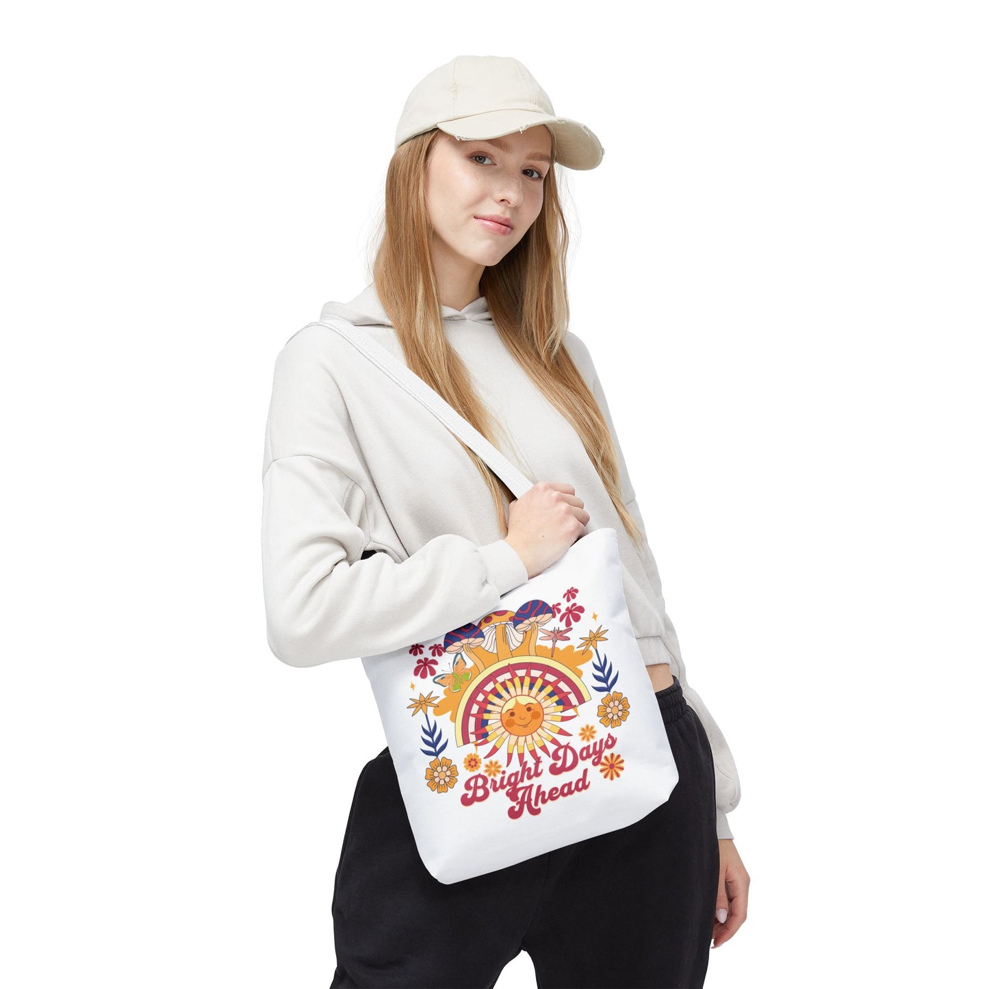 Bright Days Ahead Sunshine Floral Tote Bag with cheerful sunshine, flowers, and butterflies design. Ideal for outdoor adventures, this durable polyester bag features reinforced handles, boxed corners, and comes in various sizes.