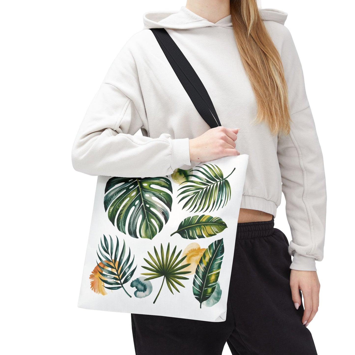 Tropical Leaves Tote Bag showcases a vibrant leaf pattern, embodying a fresh, summery vibe. Its durable, spacious design with reinforced handles makes it ideal for beach trips and everyday adventures.