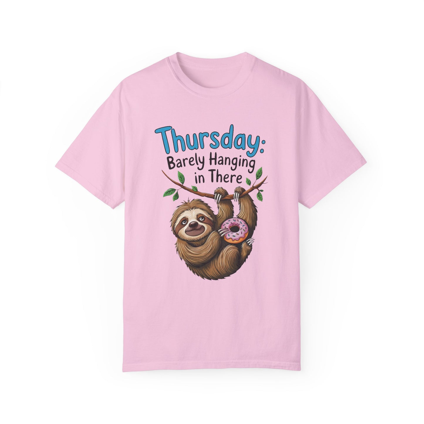 Thursday: Barely Hanging In There Sloth Graphic Comfort Colors Unisex T-Shirt features a cartoon sloth holding a donut, emphasizing a laid-back vibe, ideal for casual or relaxing occasions.