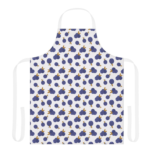Blueberries Apron featuring a playful blue fruit pattern on white fabric, perfect for adding a whimsical touch to kitchen activities. Designed for comfort and style, ideal for creative chefs or passionate bakers.