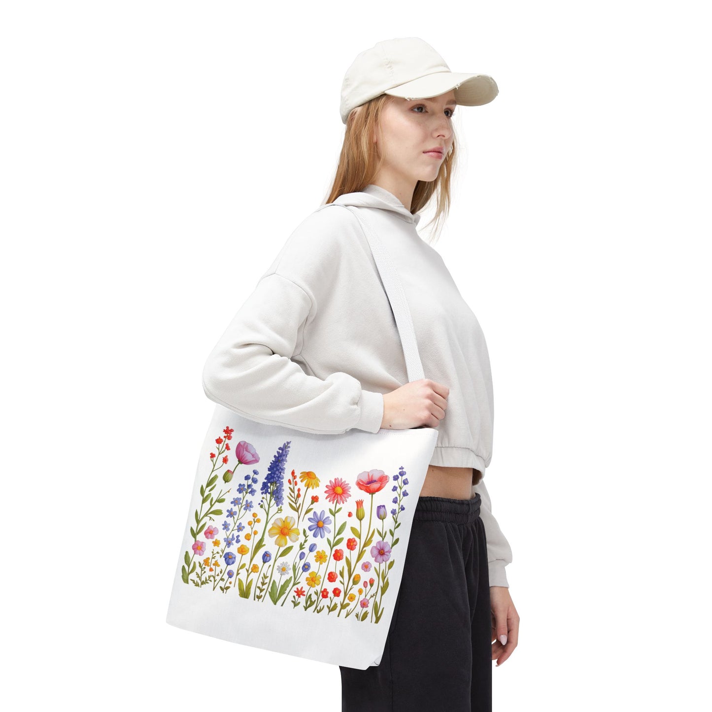Wildflowers Tote Bag featuring a vibrant wildflower design, embodying a natural, free-spirited vibe. Perfect for everyday use, with durable polyester and reinforced handles. Available in multiple sizes for versatile use.