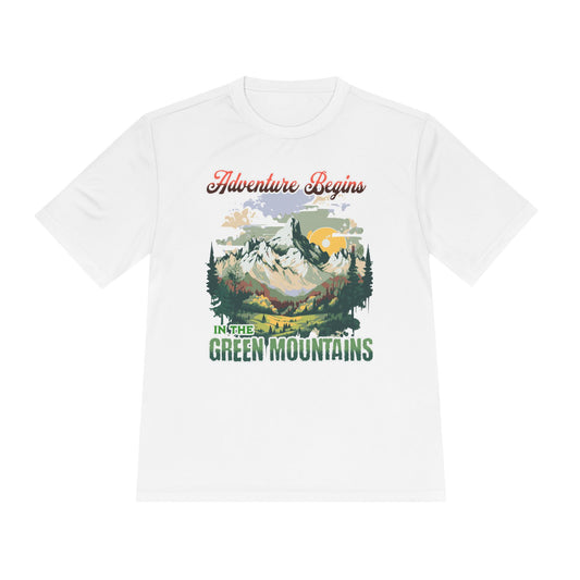 Adventure Begins in the Green Mountains Moisture Wicking Sport-Tek Unisex T-Shirt features a vivid mountain landscape with trees and sun, ideal for outdoor enthusiasts seeking comfort and style.