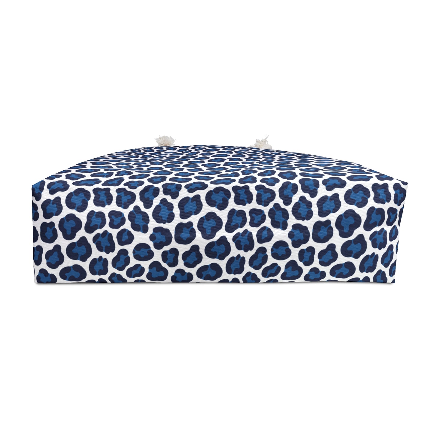 Weekender Bag Blue Cheetah Print, featuring a stylish blue and white camouflage pattern, perfect for quick getaways with its spacious design and durable cream-lined interior, ideal for fashion-forward travelers.