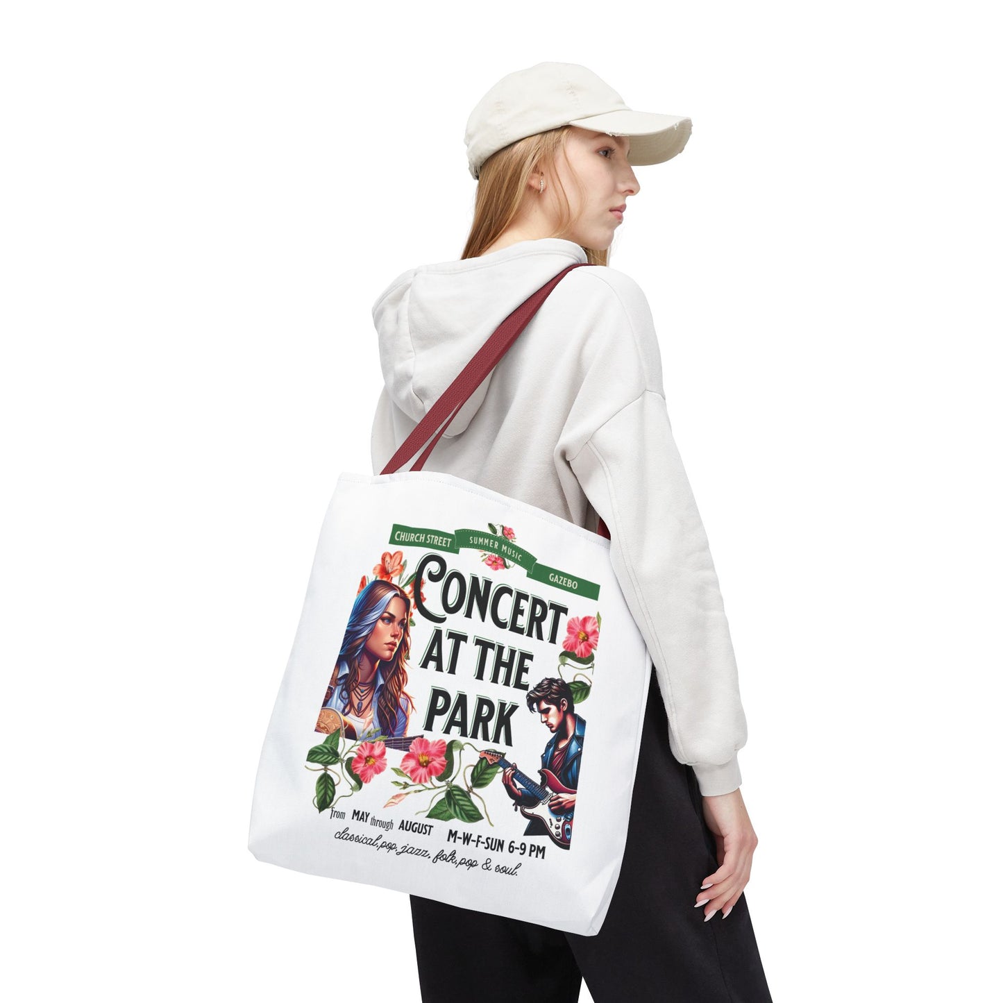 Concert At the Park Tote Bag held by woman, features lively concert design, durable polyester, ideal for outdoor activities, emphasizes style and functionality from FireBrook Essentials.