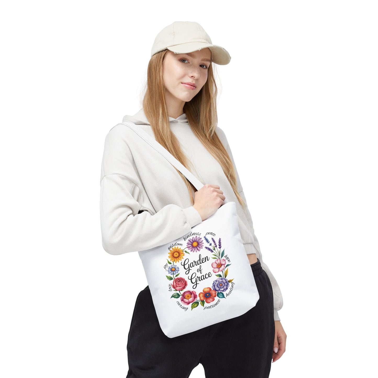 Garden of Grace Watercolor Design Tote Bag showcasing hand-drawn flowers in pastel hues with graceful script text, embodying elegance and practicality for everyday use, aligning with FireBrook Essentials' uplifting and stylish ethos.