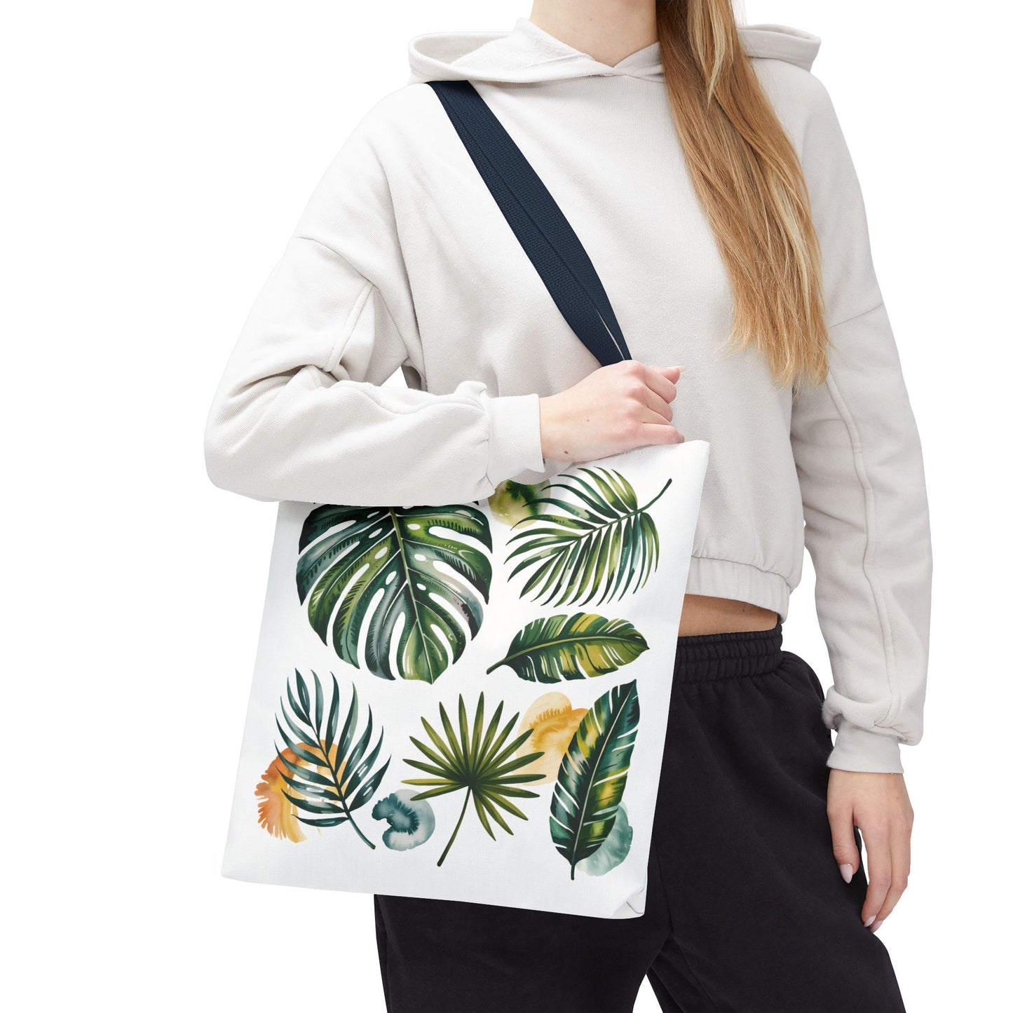 Tropical Leaves Tote Bag close-up featuring lush leaf patterns, emphasizing its durable polyester material and spacious design, perfect for stylish, eco-conscious individuals at FireBrook Designs. Ideal for beach outings and everyday use.