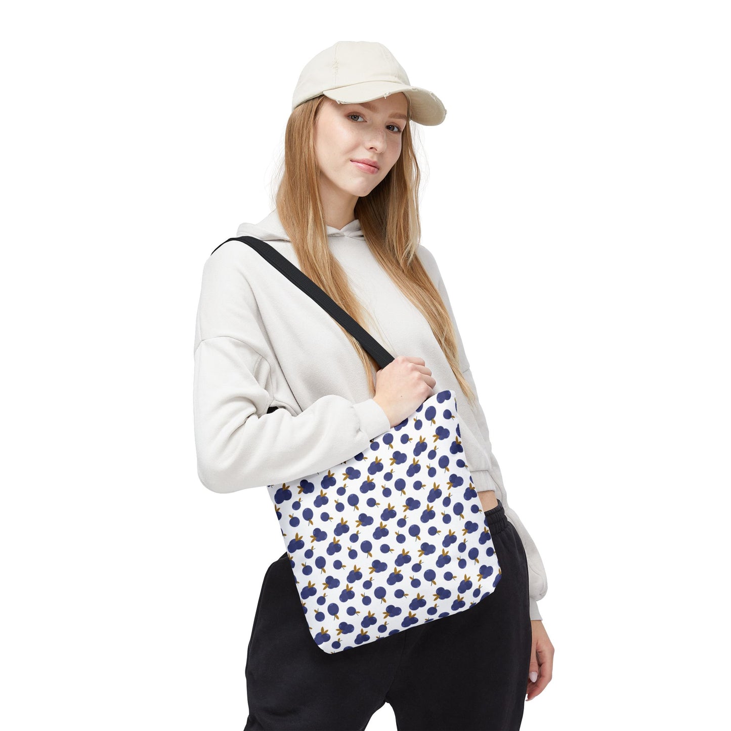 Blueberry Tote Bag features a charming blueberry pattern, durable polyester build, and reinforced handles, ideal for daily use. A practical, stylish choice from FireBrook Essentials, enhancing life with vibrant, joyful designs.